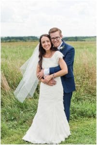 Summer navy wedding with diy paper flowers in Slippery Rock, PA. Images by Madeline Jane Photography